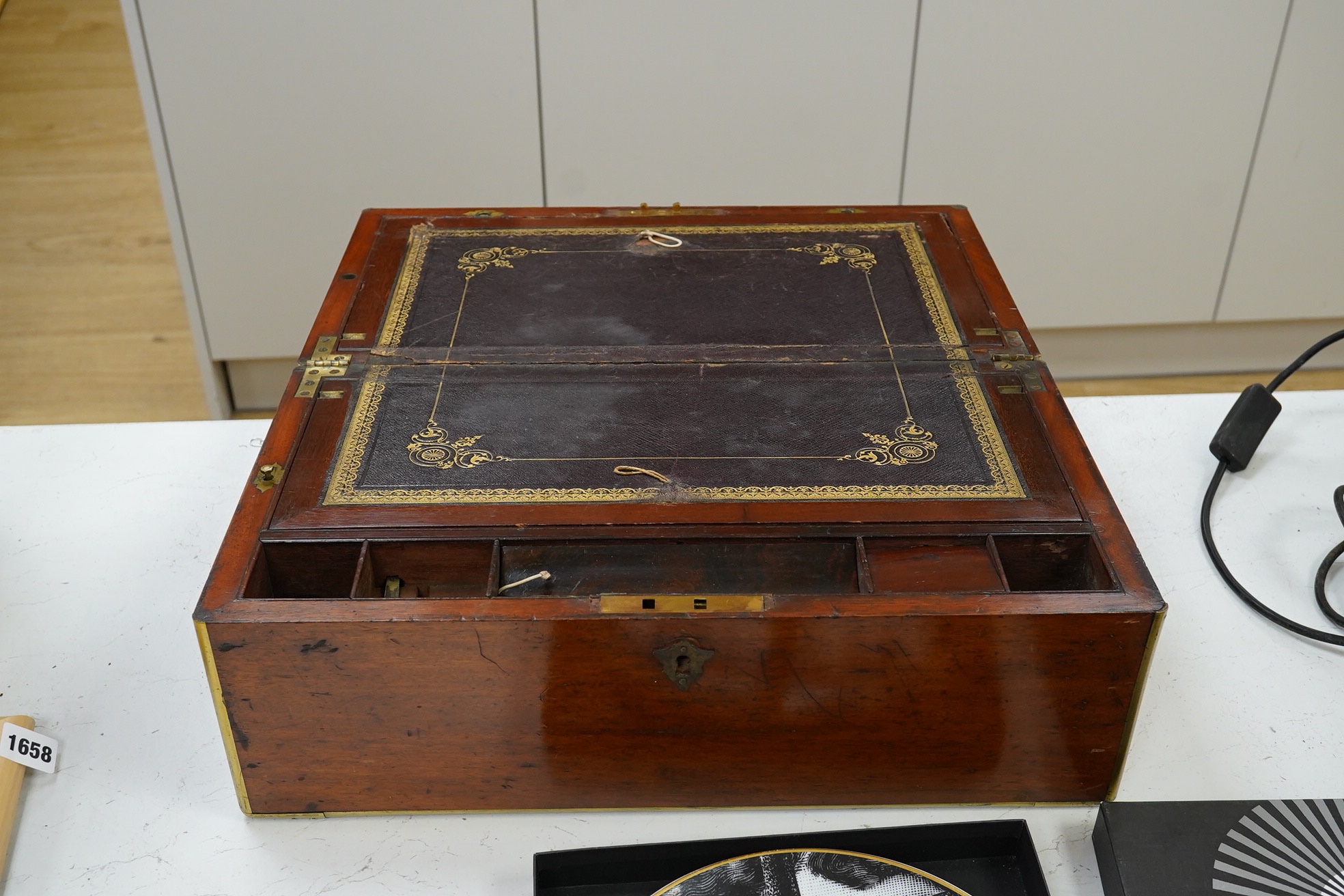 A 19th century mahogany brass bound writing box with tooled leather slope, 45cm wide. Condition - poor